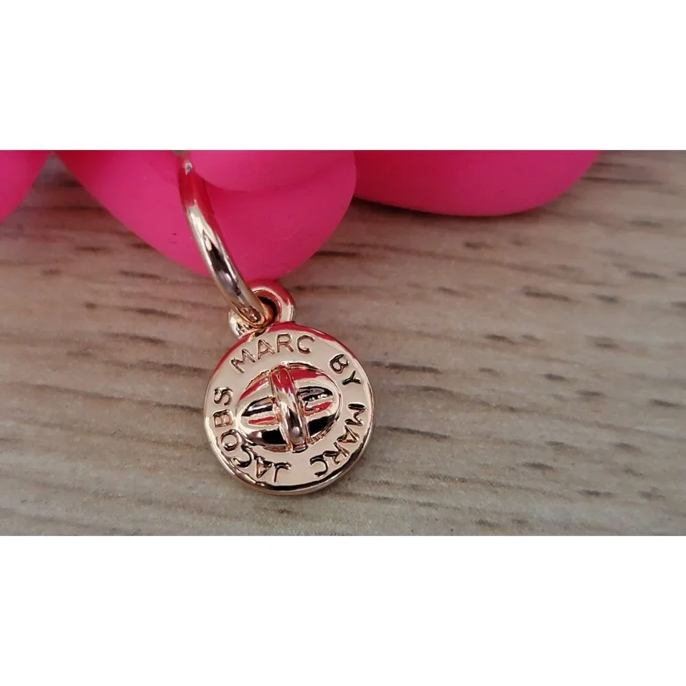 Rubberized chunky spiral bracelet with small gold Marc Jacobs logo charm; NWT. - Picture 2 of 4